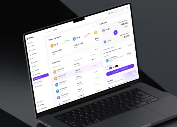 Cryptocurrency trading dashboard displayed on a laptop showing Bitcoin and Ethereum prices, transactions, market data, and crypto purchase options.